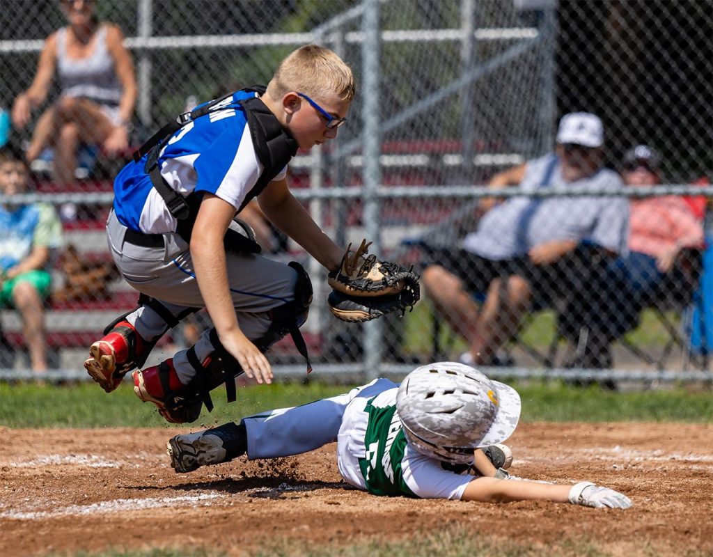 Catcher and runner; jumping play at home base